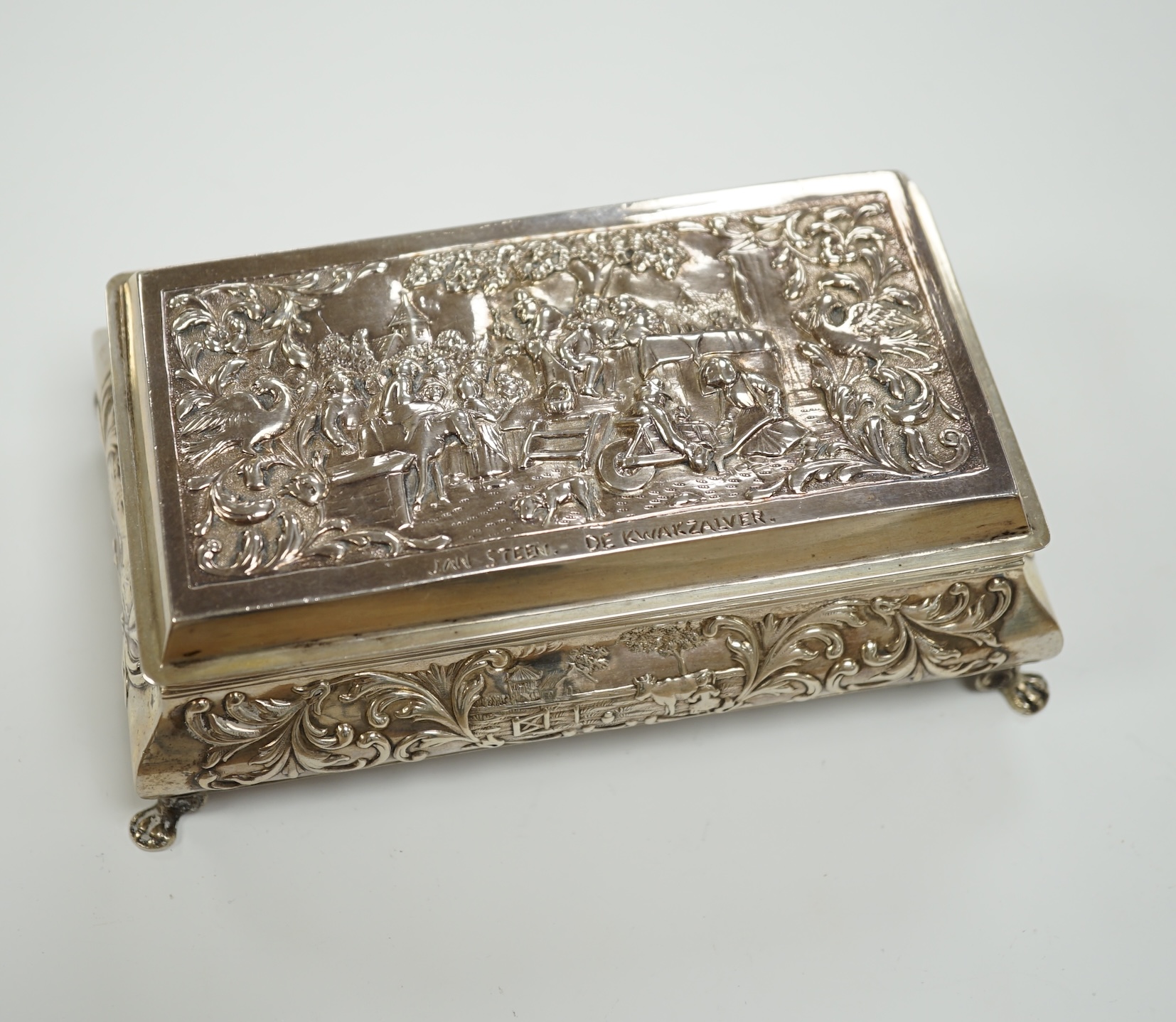 A late 19th century Dutch white metal bombe shaped rectangular trinket box, 14cm, together with an Edwardian silver trinket box, London, 1908.